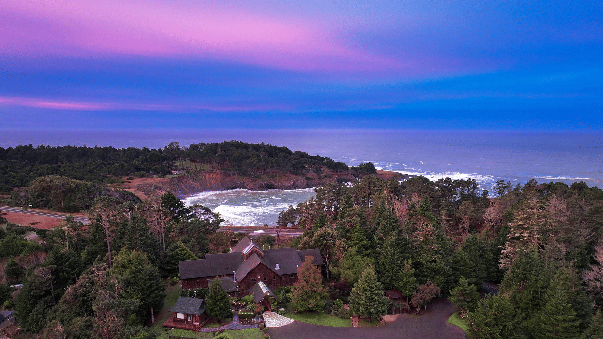Sunset over Smuggler’s Cove and the Mendocino coastline from Brewery Gulch Inn
