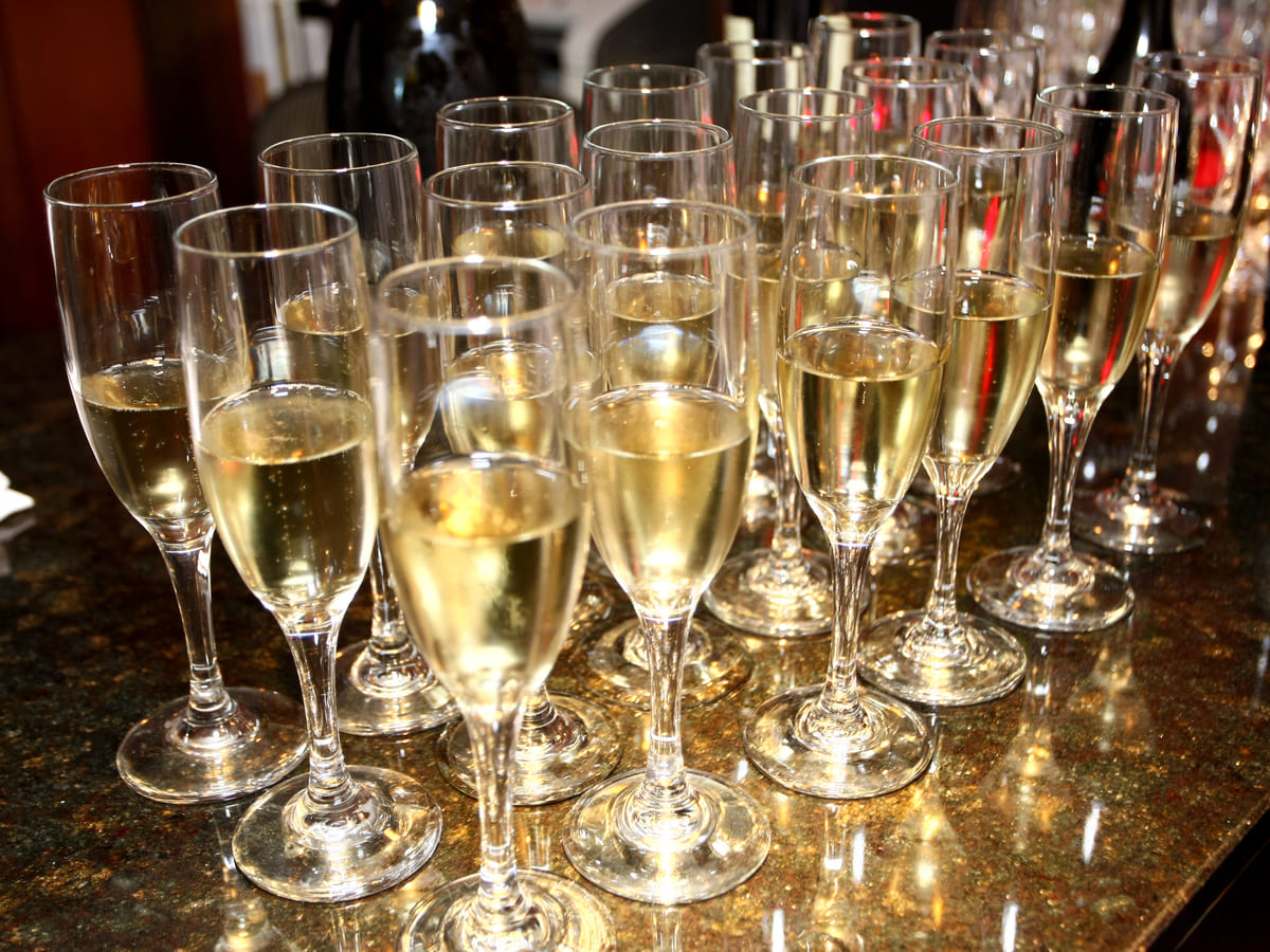 Champagne poured for a group celebration at the inn